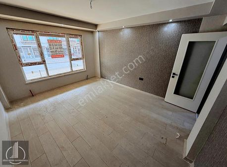 Oğuz Gezer Gayrimenkul'den Merkezi Konumda Yüksek Giriş Daire