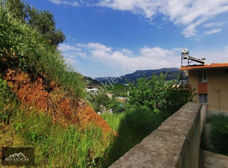 Rota Emlak'tan Gümüldür'de Zemin Kat 1+1 Satılık Daire