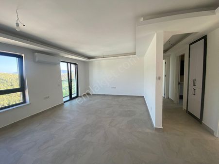 Bodrum Adabükü'nde Özel Plajlı Sitede Deniz Manzaralı Daire