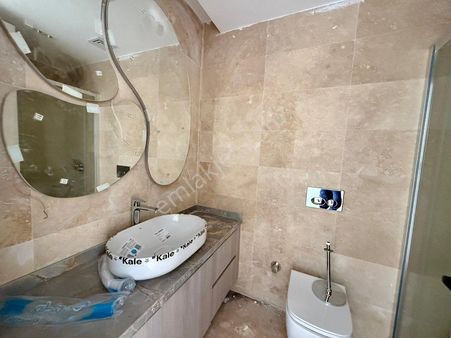 Alanya Mahmutlar'da Aktiviteli Sitede Denize Sıfır Daire