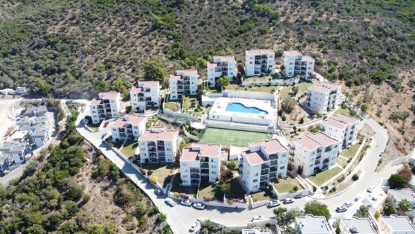 Milas Güllük'te Site İçinde Kapanmaz Deniz Manzaralı Daire