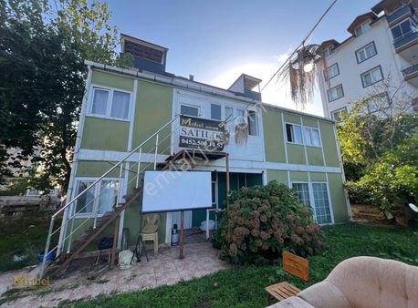 Mabel'den İçinde Pr.ev Bulunan Denize Sıfır 200 M2 Satılık Arsa