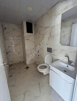 **toplukonuta Cephe Satılık 1+1 Daireler**