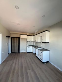 Kuşadası Davutlar’da 1 + 1 Yazlık Sıfır Daire Satılık