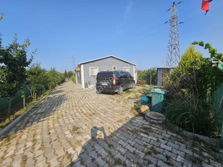 Acill Buca Karacağaç Mevki 1.665m2 İçerisinde Prefabrik Ev 'li Satılık Bahçe