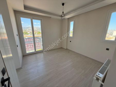 Bolkar Emlaktan Yenişehir Kocavilayet’te Geniş 2+1 Şık Amerikan Mutfaklı Daire**