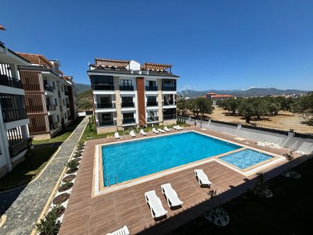 Güre'de Satılık Havuzlu Asansörlü Dubleks Daire