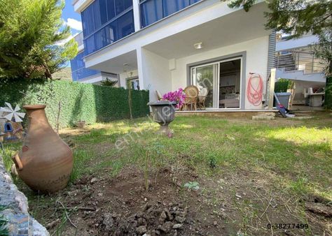 Didim Akbük 'te Geniş Bahçeli Eşyalı 1+1 Daire