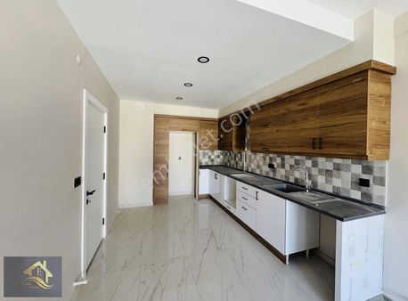 Davutlar'da Ara Kat Ebeveyn Banyolu 80m2 Satılık 2+1 Sıfır Daire