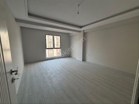 Dumlupınarda Sıfır Yerden Isıtmalı Otoparlı 3+1 Arakat Ön Cephe Daire