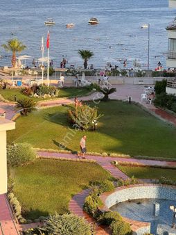 Müjgan Emlak'tan Siteler'de Denize Sıfır Eşyalı Kiralık Daire