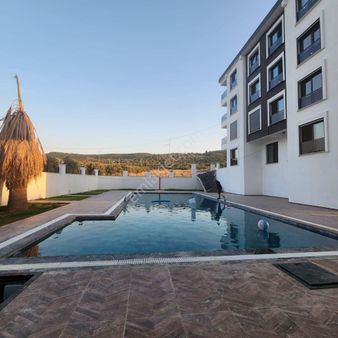 Didim'de Asansörlü Havuzlu Sitede Sıfır 2+1 Satılık Daire