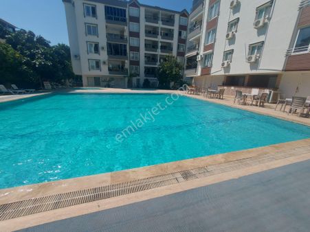 Didim Merkezde Havuzlu Güvenlikli Sitede Ara Kat Asansörlü 2+1