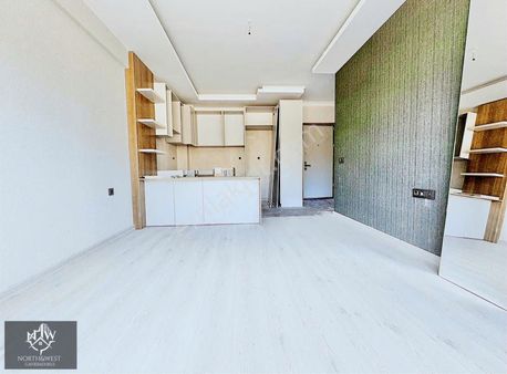 North West'ten İncek'te 7/24 Güvenlikli Sitede Satılık 1+1 Daire