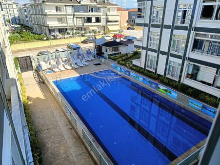 Yılmazdan Havuzlu Güvenlikli Kombili Denize Yakın 2+1 Daire