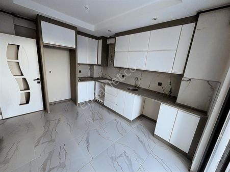 Zümrütevler Mah. Asansörlü Çift Balkonlu 2+1 Satılık Sıfır Daire