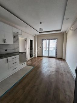 Ay Gayrimenkul'den Sarıçam Osmangazide 1+1 Yatay Mimari Satılık Daire