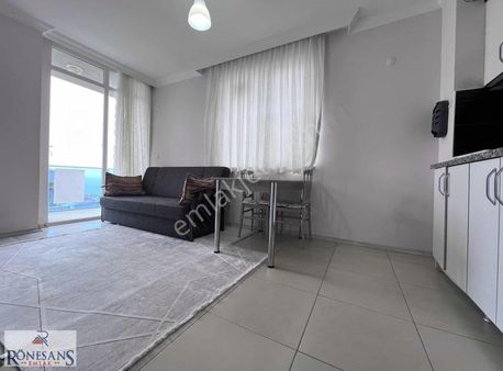 Rönesans Emlak'tan Tramvay Altında Deniz Manzaralı Eşyalı 1+1