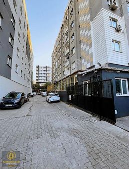 Yenişehirin Kalbinde, Firuze Kahve Üstü Modern 2+1 Fırsat Daire