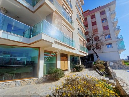 Güzelbahçe Mustafa Kemalpaşada Satılık Havuzlu Sitede 5+1 Daire