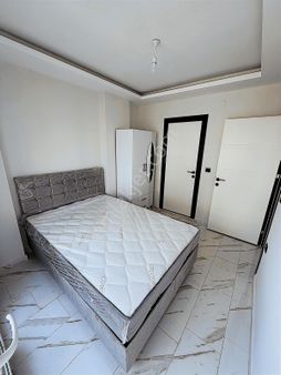 Atü Yanında 1+1 Geniş Oturum Sıfır Eşyalı Kiralık Daire