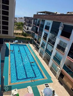 Kuşadası Davutlarda Satılık Havuzlu Sitede 75 M2 Daire