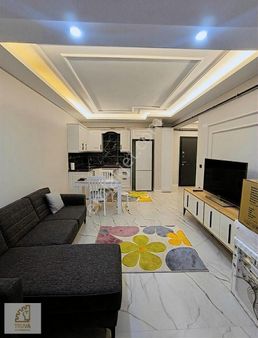 Truva'dan Atakum Gökdelenler Bölgesinde Kiralik Eşyalı Geniş 1+1