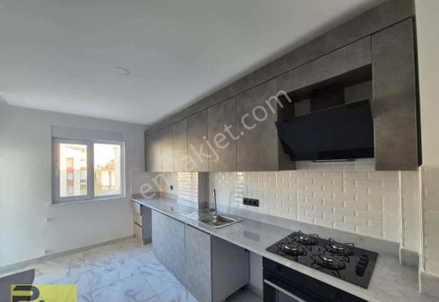 Aydoğmuş'ta 110m2 Sıfır 2+1 Katta Satılık Daire