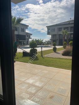 Didim'de Havuzlu Site İçerisinde Aciliyetten Satılık Sıfır Eşyalı 2+1 Daire