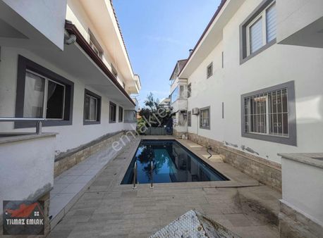 Fethiye Foça Mh.de Havuzlu Sitede Satılık 2+1 Zemin Kat Daire.