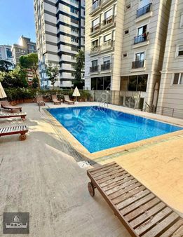 Utkudan Erenköyde Bağdata Yakın Güvenlikli Havuzlu Satılık 2+1