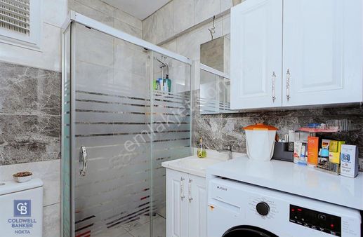 Foça Yenibağarası Mah. Satılık 2+1 Bahçe Katı Daire