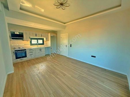 Uytundan Güre'de Ultra Lüks Tasarımlı 2+1 Ön Cephe Satılık Daire