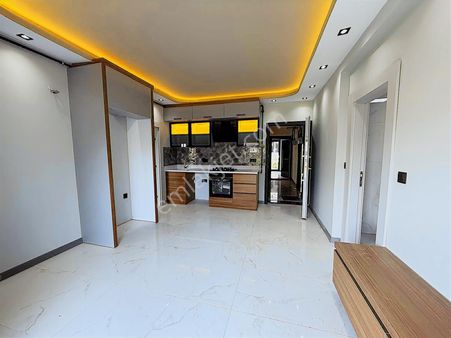 Güzelobada Bahçe Kullanımlı Doğalgazlı Satılık Sıfır 1+1 Daire