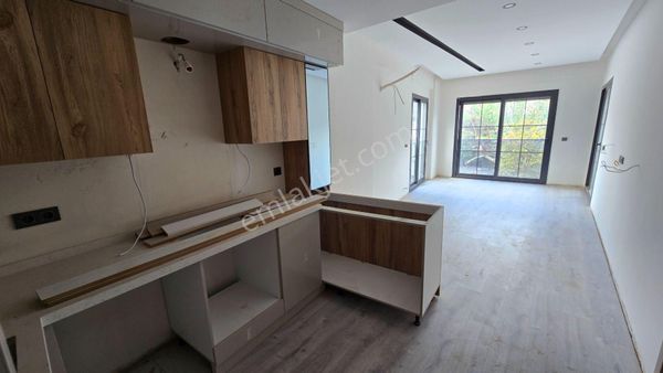 Kuşadası Güzelçamlı’da Sıfır 2+1 Balkonlu Ara Kat Daire