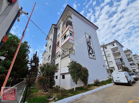 Kuşadası'nda Huzurlu Yaşam - Yatırımlık 2+1 Daire Sizi Bekliyor!