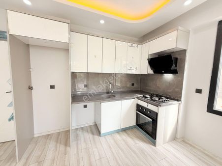 Utku'dan Akçay Kordon'da Denize 50 Metre Ön Cephe Lüks 1+1 Daire