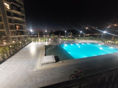 Deniz, Havuz, İzmir Manzaralı Site İçi Arakat, D.gazlı, Klimalı, K.mutfak 2+1 Daire