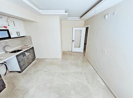 Haftanın_fırsatı_geniş_mutfaklı_yapılı_masrafsız_yeni_bina_2+1_-