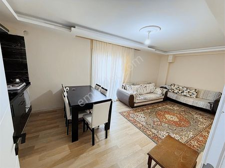 Kuşadası Davutlar Merkezde Satılık 2+1 Bahçe Katı Daire