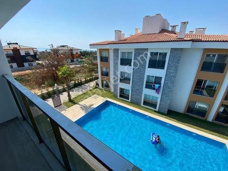 Kuşadası Davutlar’da Havuzlu Site İçerisinde 3+1 Çatı Dubleks Satılık