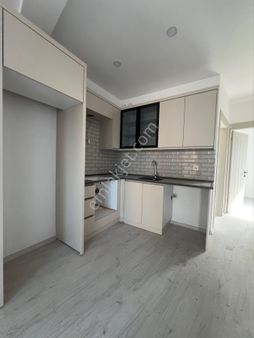 Kuşadası Davutlar‘da Fırsat 2 + 1 Ara Kat Daire Satılık