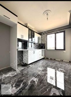 Büşra Gayrimenkulden Yeni Mahallede Satılık Sıfır Daire 2+1 Kat 1 80m2 Doğalgazlı Balkonlu