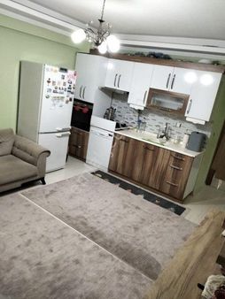 Karşıyaka Cumhuriyet Mahallesinde 1+1 Satılık Daire