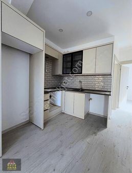 Kuşadası Davutlar'da Fırsat Daire 2 + 1 Satılık