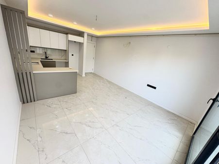 Kuşadası Kadınlar Denizi'nde Sıfır 2+1 Satılık Lüks Daire