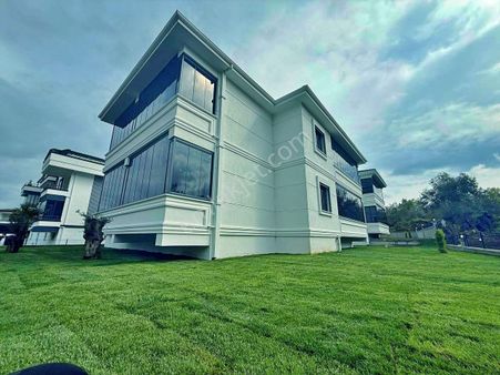 Uytundan Güre'de Yeşillikler Arasında Cam Balkonlu 2+1 Daire