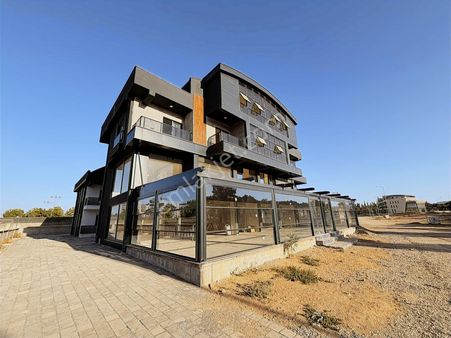 Altıntaş Kardeş Kentler Caddesi'nde İskanlı Satılık Dükkan