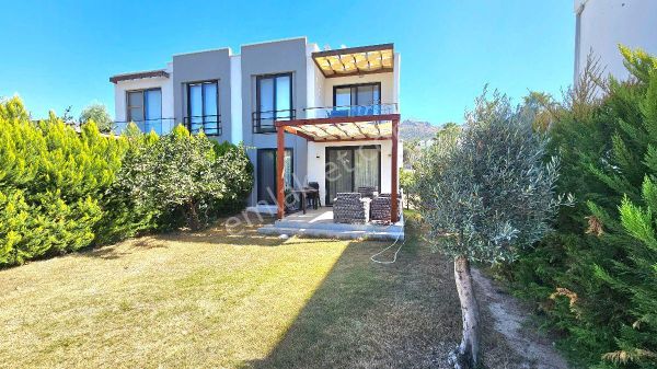 Bodrum Küçükbükte Satılık Havuzlu Sitede 2+1 Geniş Bahçeli Daire