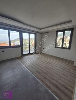 Yenifoça'da Full Deniz Manzaralı Satılık Sıfır 2+1 Arakat Daire